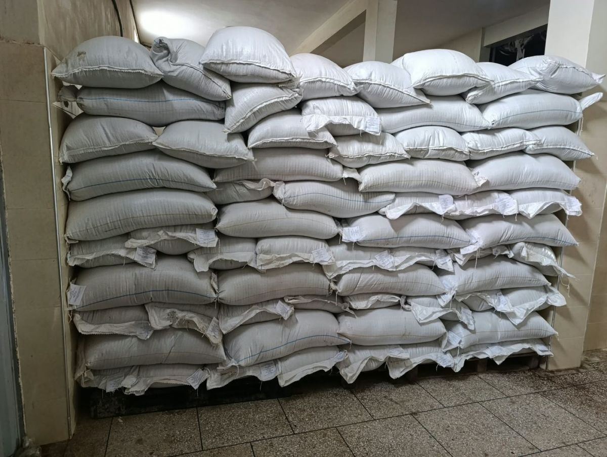 Sacks of dried plants stacked in the warehouse